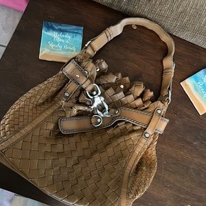 General wear and tear. Broke in but still in great condition, dk tan leather